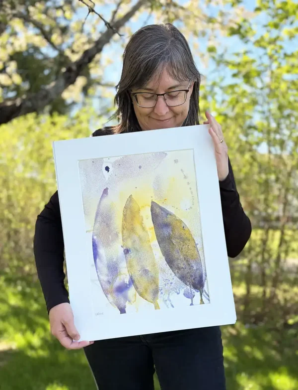 Foto av tavlan "Den vida gyllende världen". En akvarell målad av Helene Engström